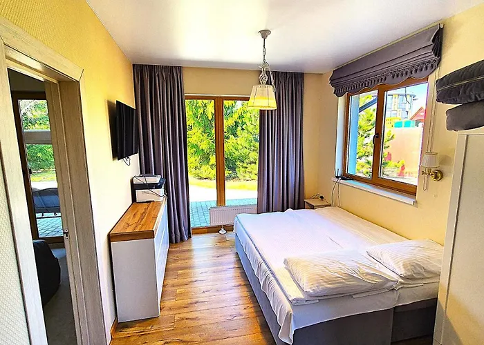 Апартаменты Atostogu Bustas Su Jacuzzi *